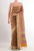 Yellow Tussar Saree with Printed design on the body and Zari Border.  displayed on a mannequin