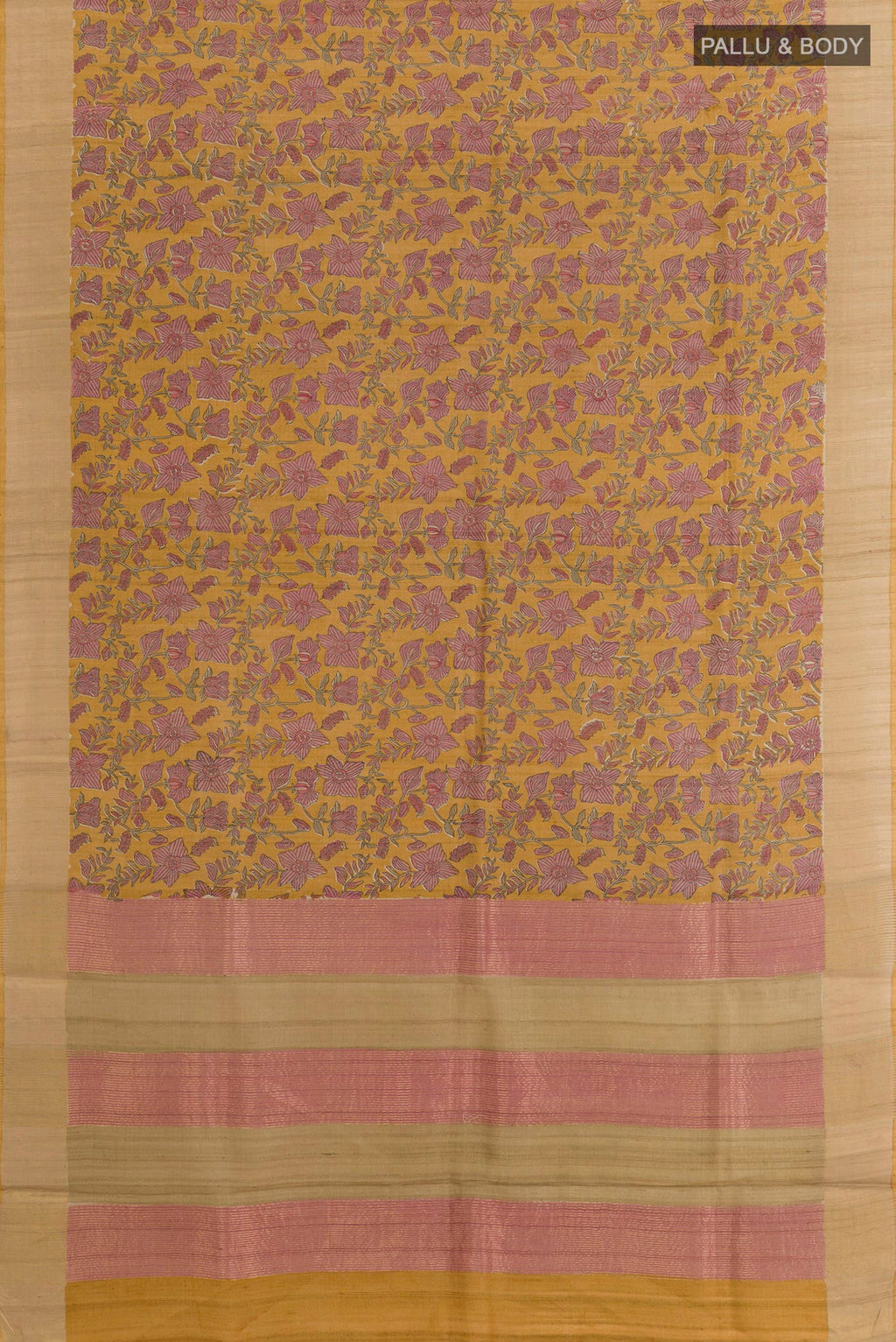 Flat view of Yellow Tussar Saree with Printed design on the body and Zari Border. 