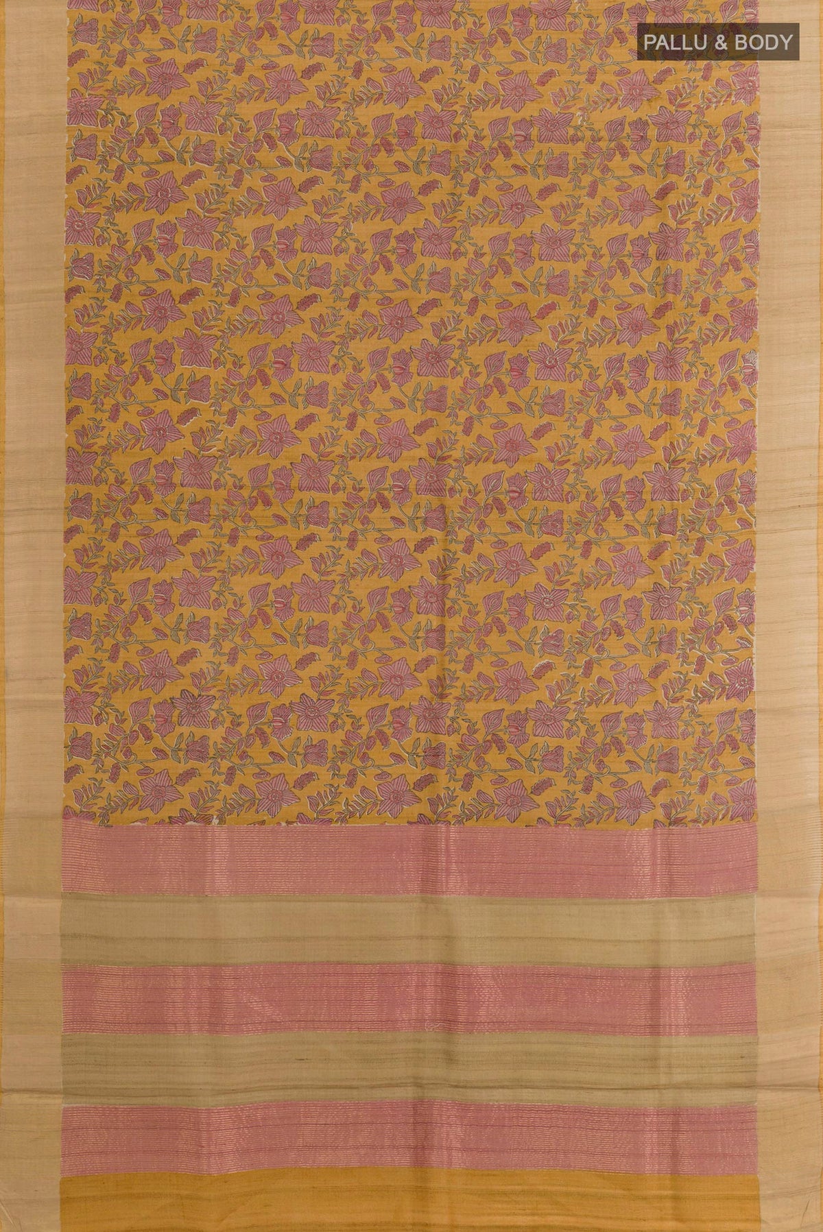 Flat view of Yellow Tussar Saree with Printed design on the body and Zari Border. 