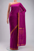 Magenta Uppada Silk Saree with Thread Butta on the body and Zari Border displayed on a mannequin