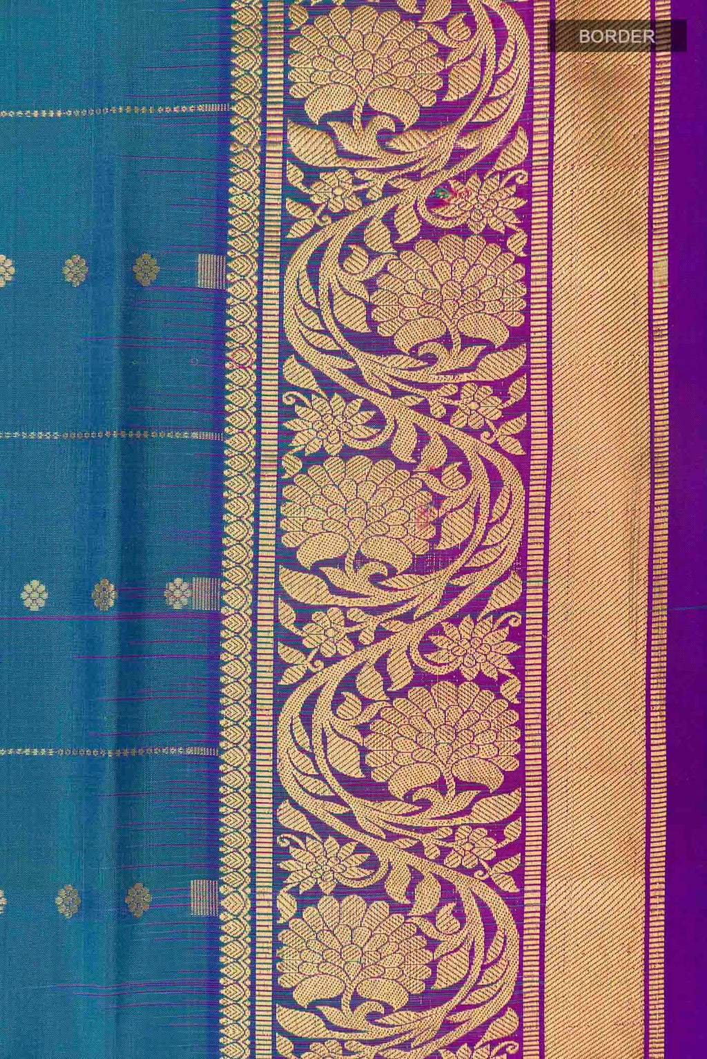 Border image of Peacock Blue Dual Tone Soft Silk Saree with Stripes on the body and Zari Border
