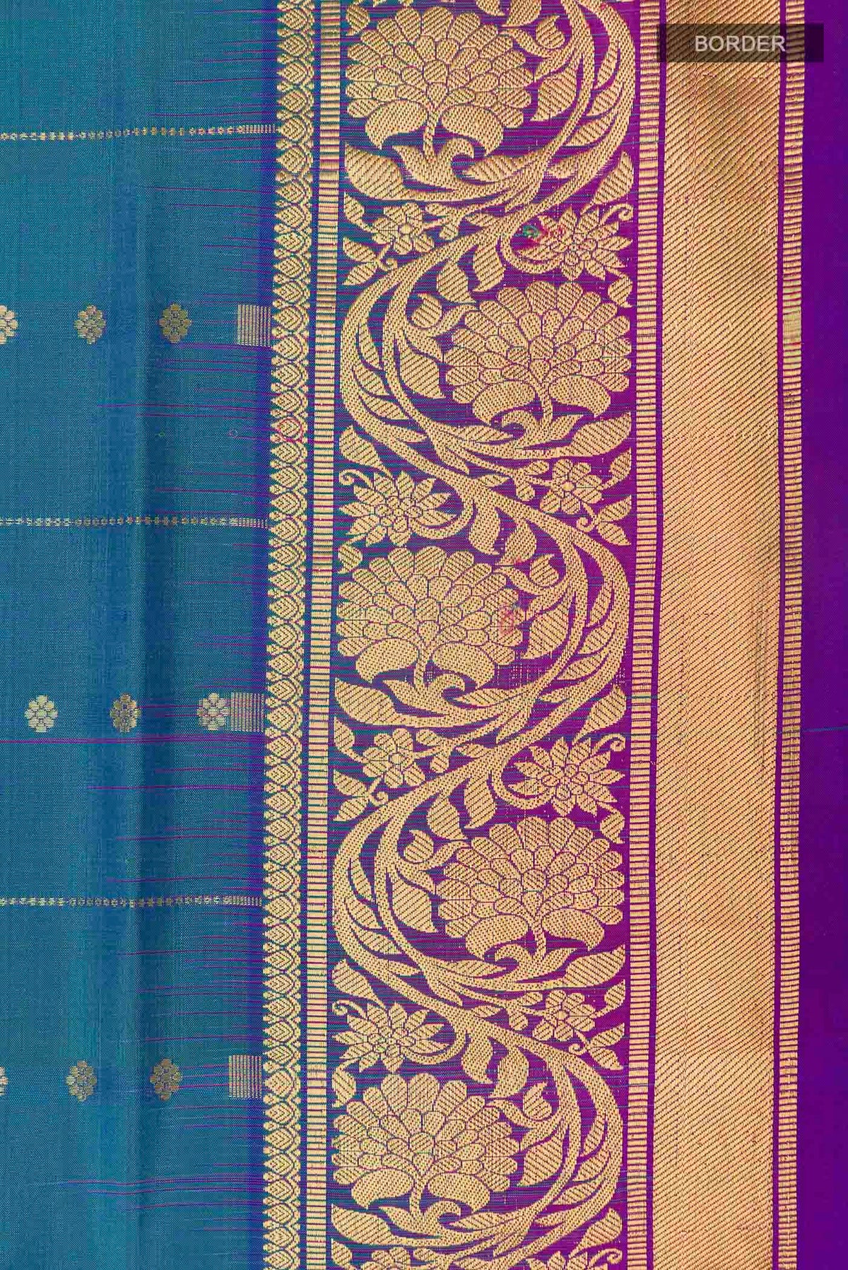 Border image of Peacock Blue Dual Tone Soft Silk Saree with Stripes on the body and Zari Border