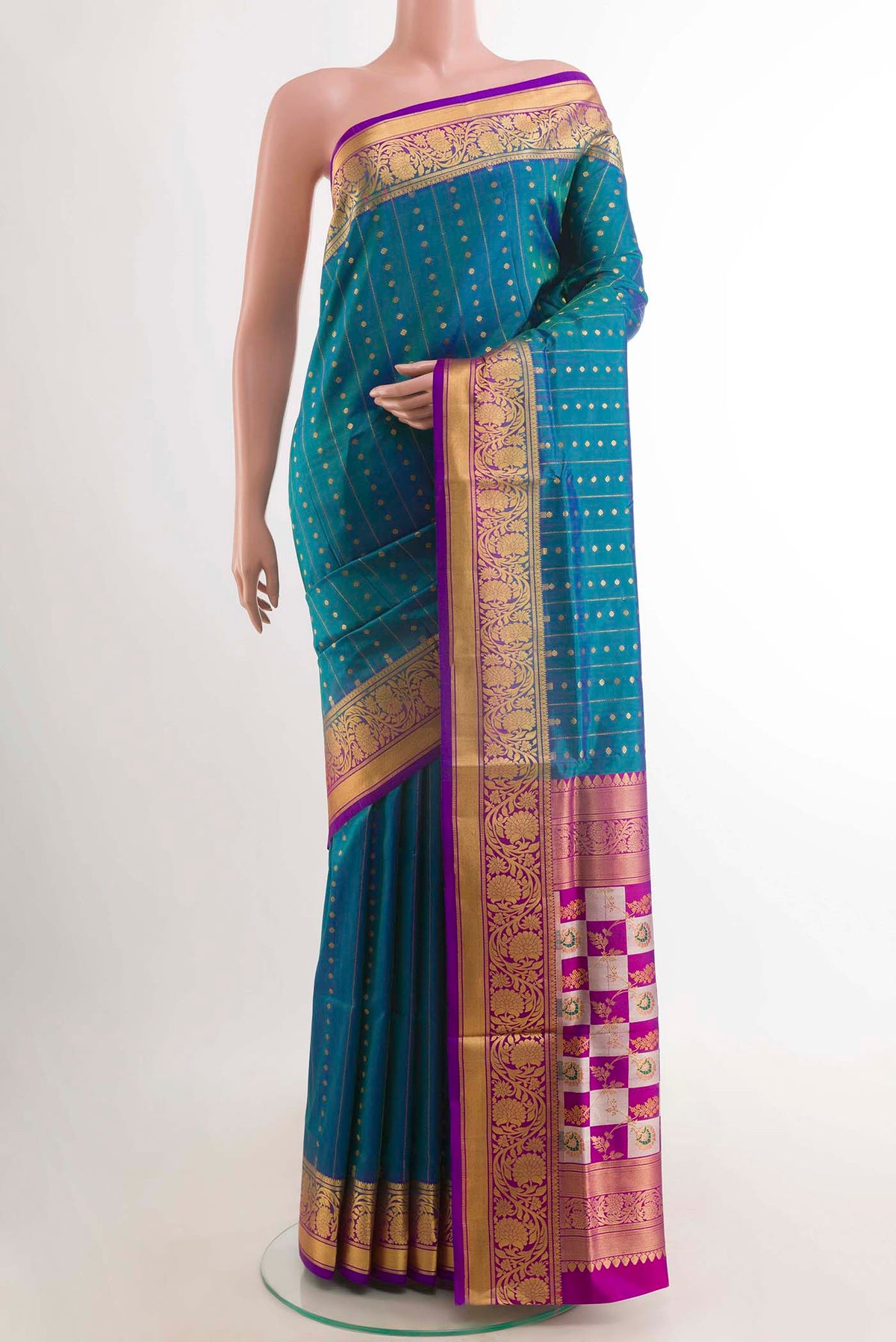 Peacock Blue Dual Tone Soft Silk Saree with Stripes on the body and Zari Border displayed on a mannequin
