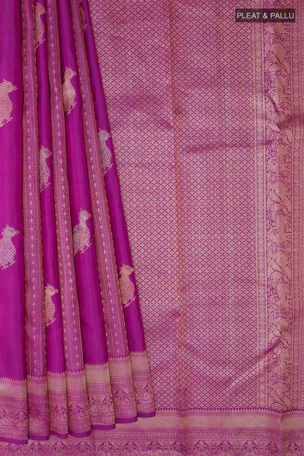 Pleats and pallu of Purple Kanchipuram Silk Saree with Zari Butta on the body and Zari Border