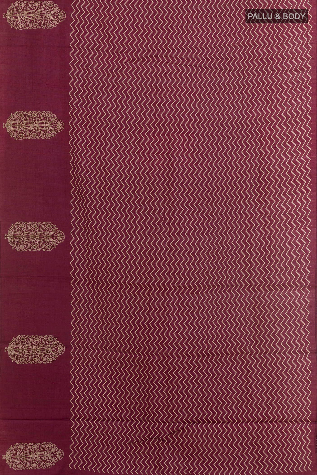 Flat view of Magenta Tussar Saree with Printed design on the body and Zari Border. 