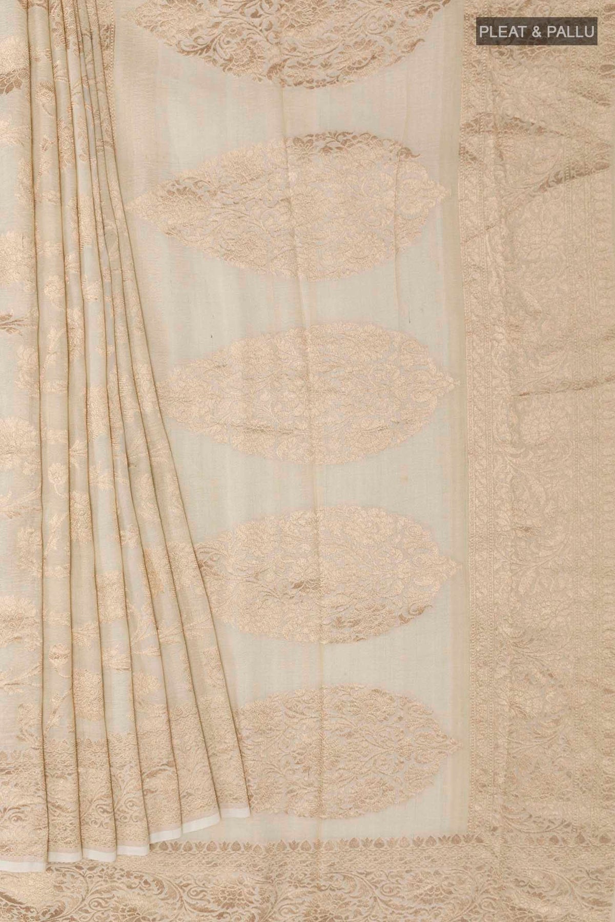 Pleats and pallu of Off White Banarasi Tussar Georgette Saree with Zari Brocade on the body and Zari Border