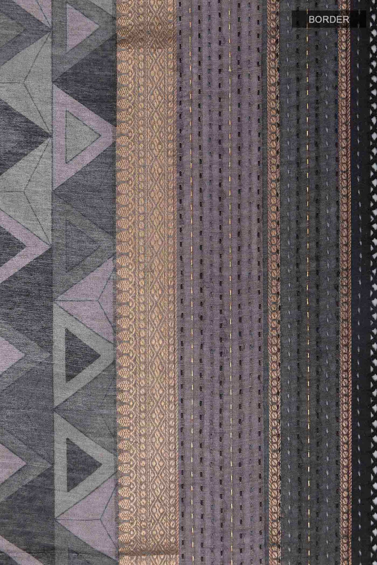 Border image of Grey Tussar Saree with Printed design on the body and Zari Border