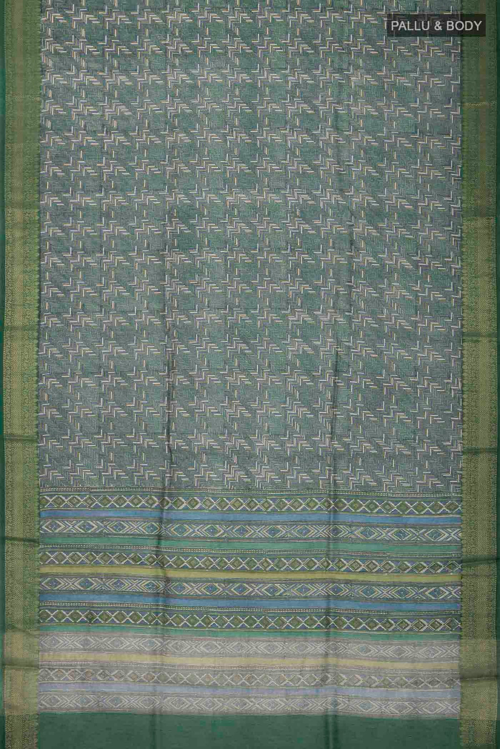 Flat view of Green Tussar Silk Saree with Printed design on the body and Zari Border