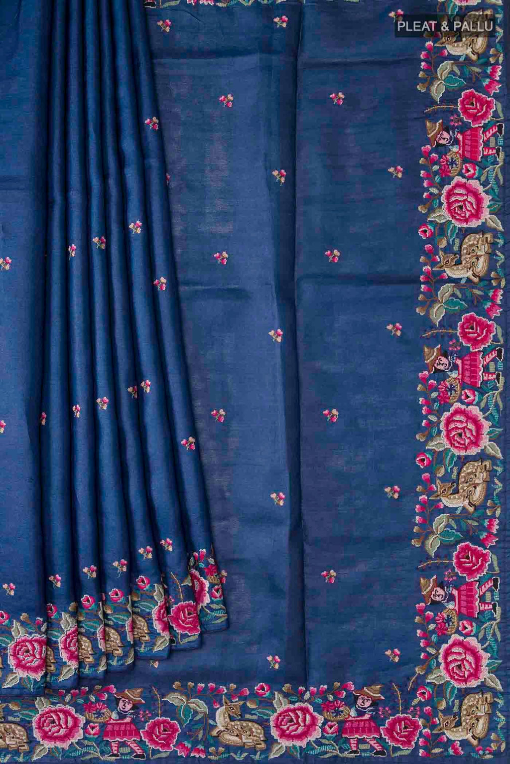 Pleats and pallu of Blue Tussar Silk Saree with Embroidery on the body and Embroidery Border