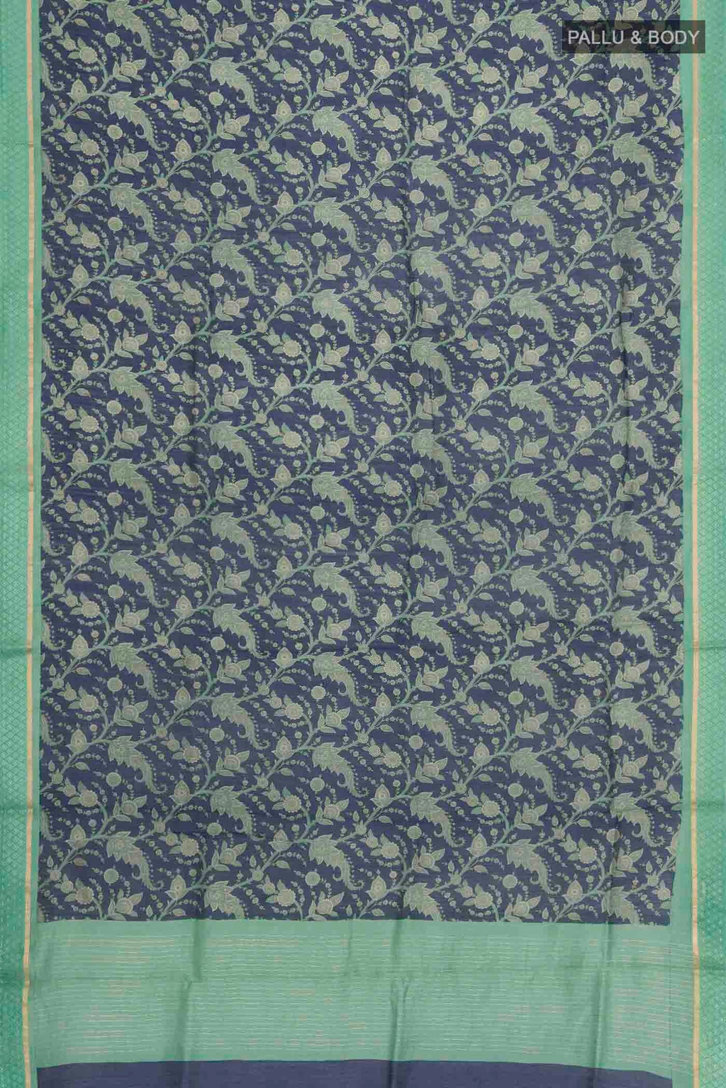 Flat view of Blue Tussar Silk Saree with Printed design on the body and Zari Border