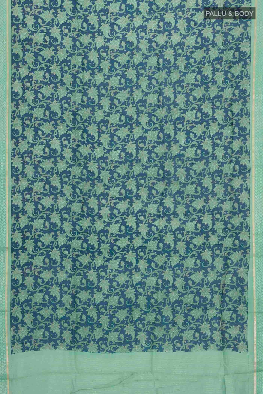 Flat view of Blue Tussar Silk Saree with Printed design on the body and Zari And Thread Border