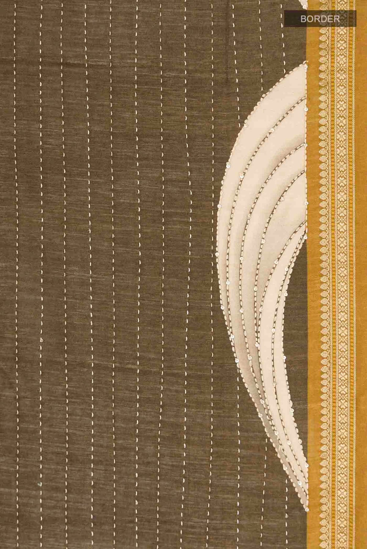 Border image of Green Tussar Silk Saree with Embroidery on the body and Zari Border