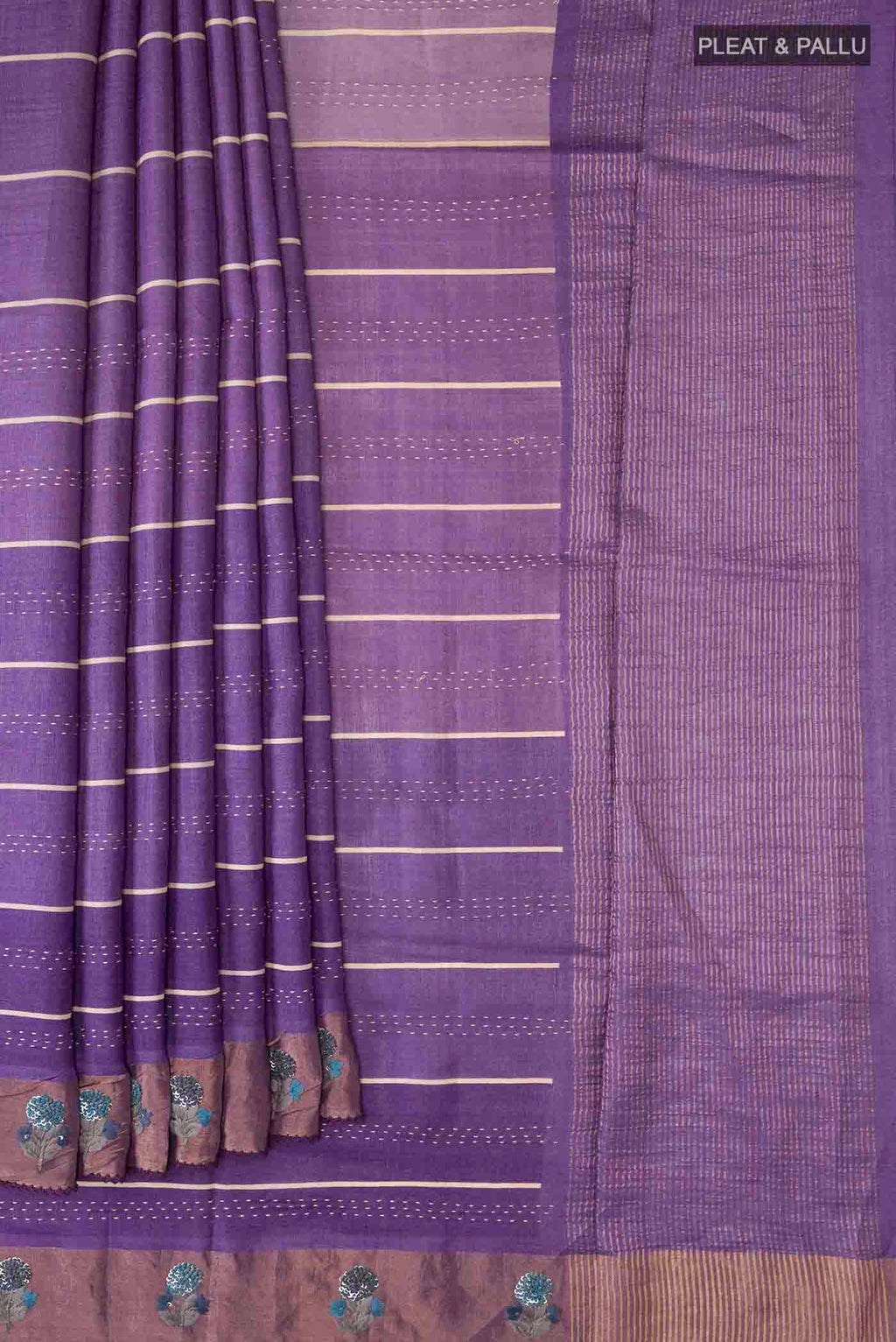 Pleats and pallu of Lavender Tussar Silk Saree with Embroidery on the body and Zari Border