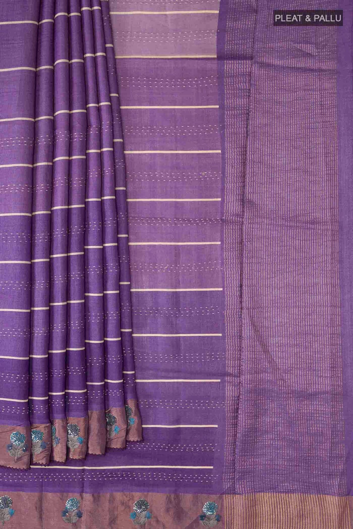 Pleats and pallu of Lavender Tussar Silk Saree with Embroidery on the body and Zari Border