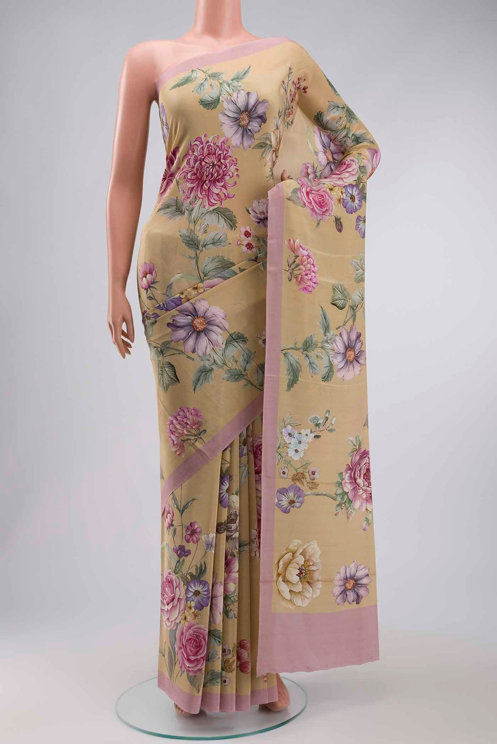 Beige Mysore Crepe Saree with Printed design on the body and Plain Border displayed on a mannequin