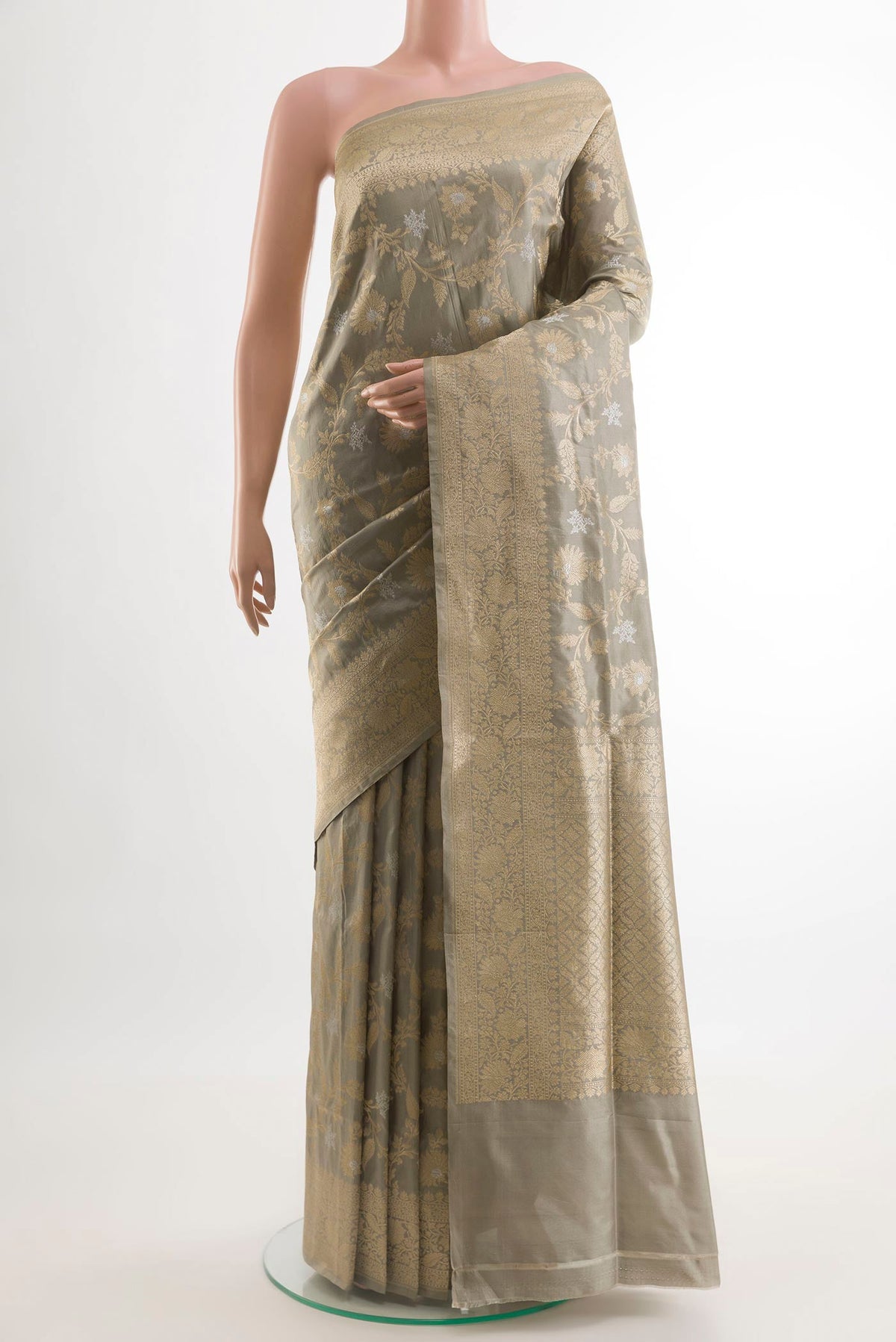 Grey Banarasi Silk Saree with Zari Brocade on the body and Zari Border.  displayed on a mannequin