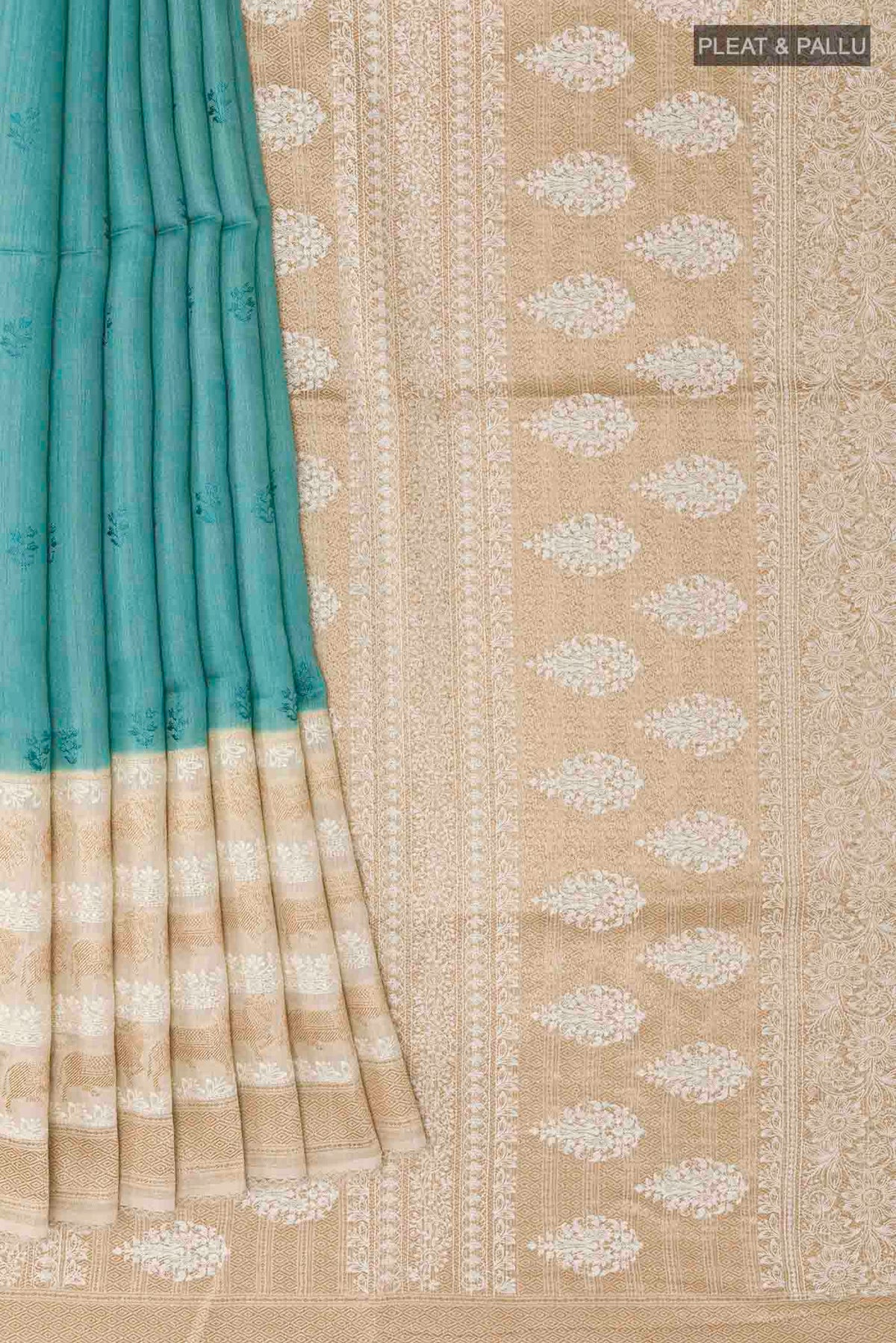 Pleats and pallu of Blue Tussar Saree with Thread Butta on the body and Thread Border