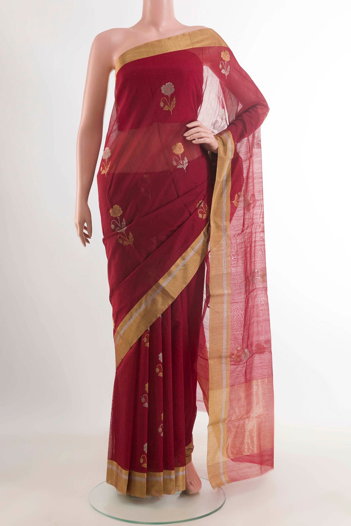 Maroon Chanderi Silk Cotton Saree with Zari Butta on the body and Zari Border displayed on a mannequin