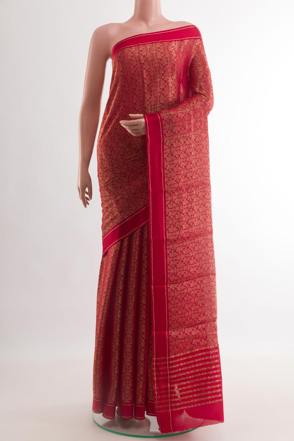 Red Mysore Crepe Saree with Zari Brocade on the body and Zari Border.  displayed on a mannequin