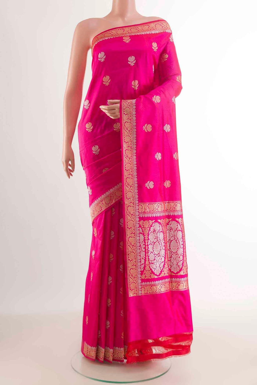 Pink Banarasi Silk Saree with Zari Butta on the body and Zari Border displayed on a mannequin
