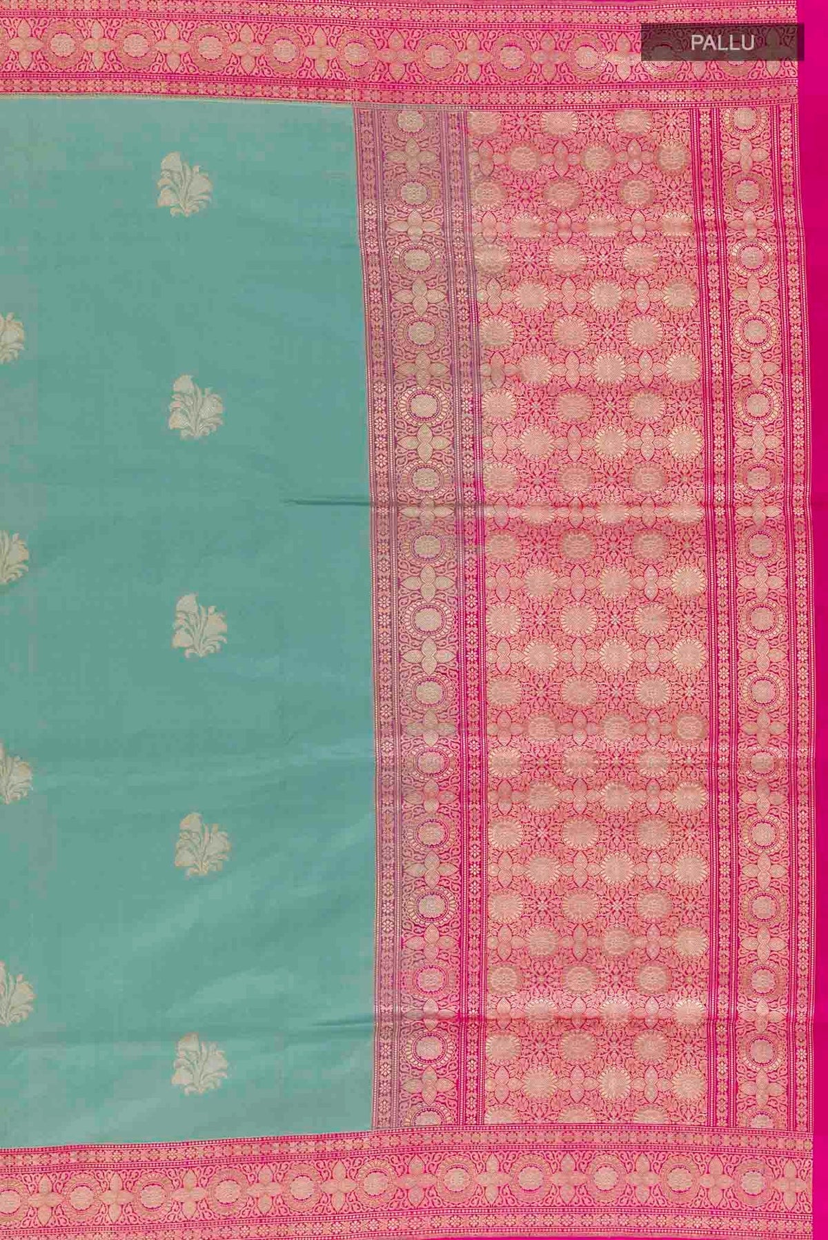 Close up image of the pallu of Blue Grey Banarasi Silk Saree with Zari Butta on the body and Zari Border