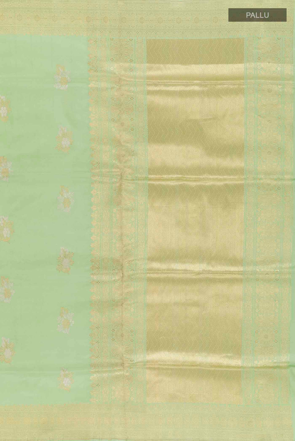 Close up image of the pallu of Green Banarasi Silk Saree with Zari Butta on the body and Zari Border
