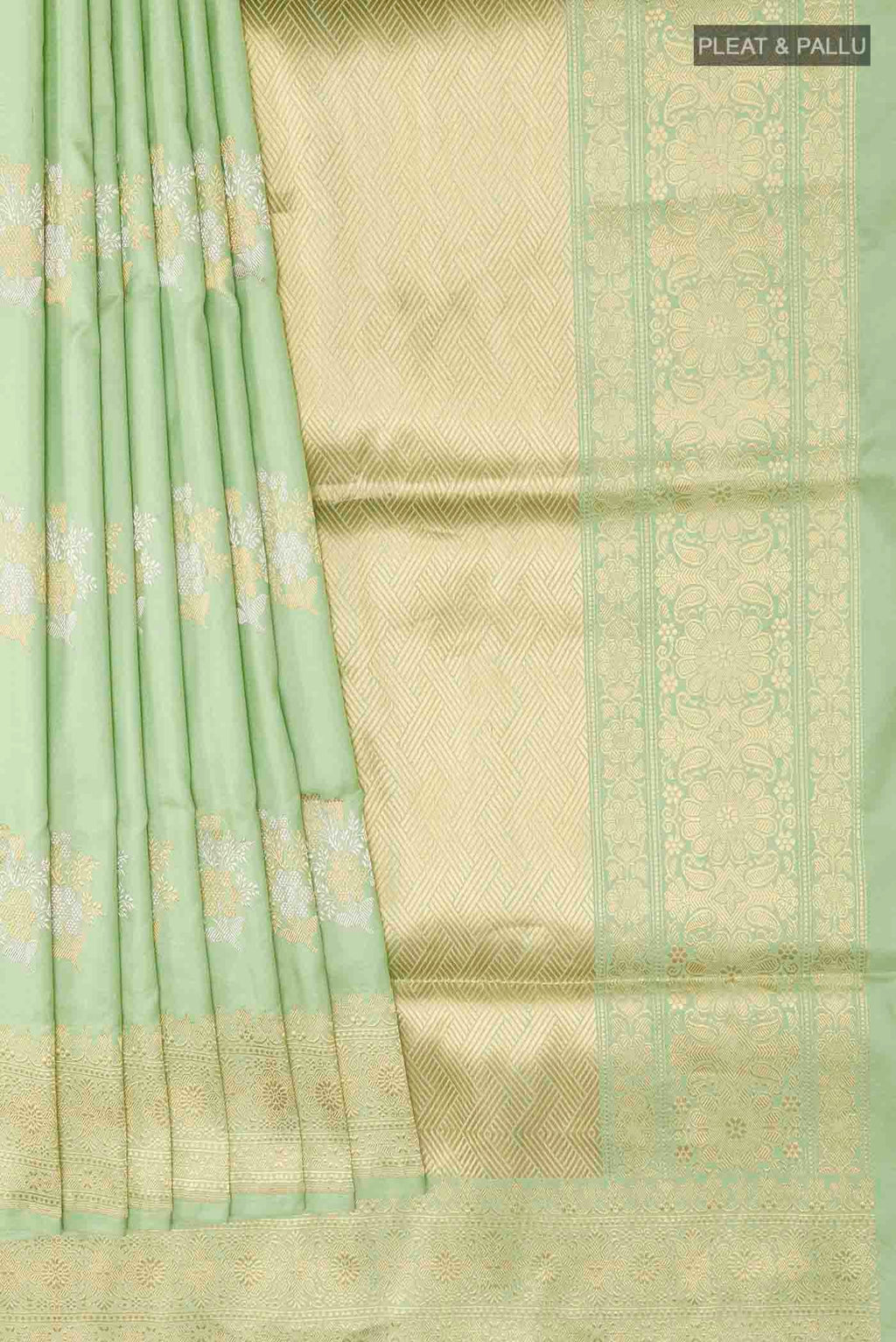 Pleats and pallu of Green Banarasi Silk Saree with Zari Butta on the body and Zari Border