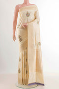 Cream Banarasi Silk Saree with Zari Butta on the body and Zari Border displayed on a mannequin