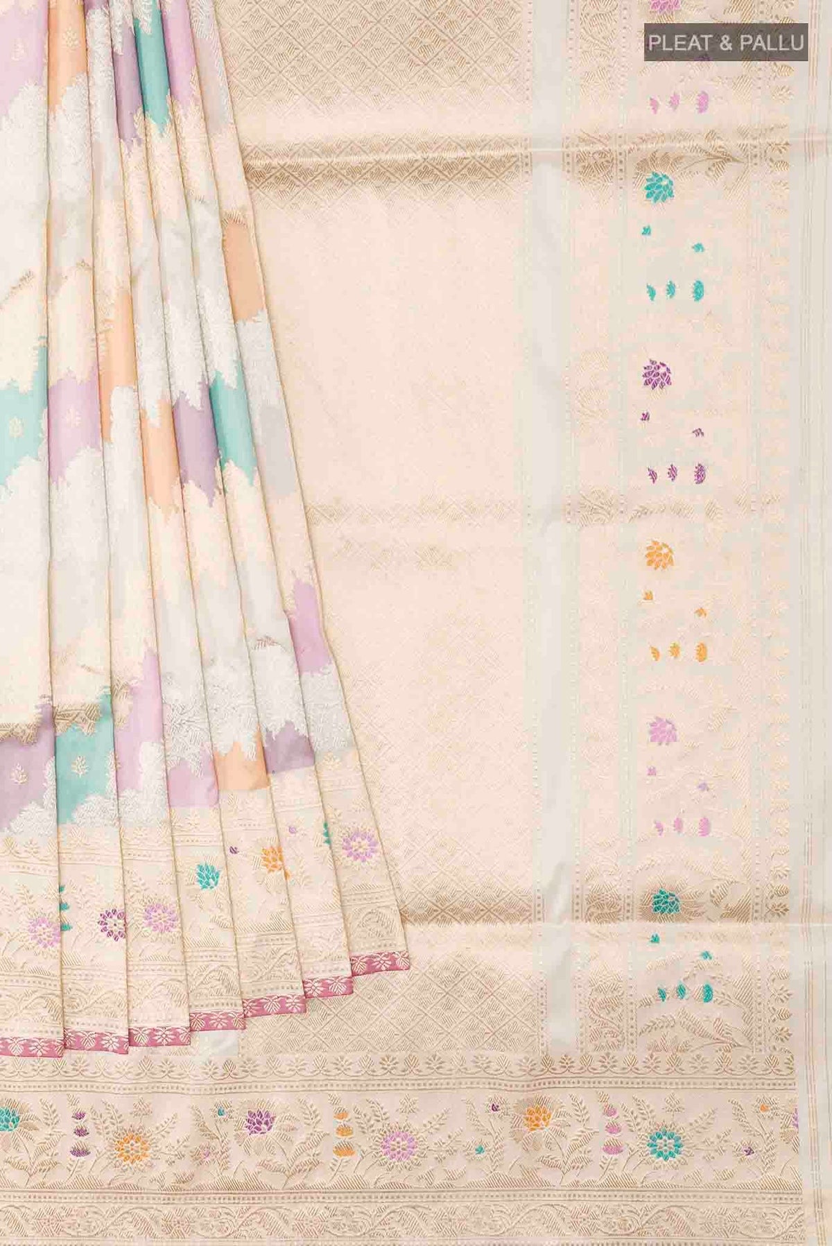 Pleats and pallu of Off White Banarasi Silk Saree with Zari Brocade on the body and Zari Border