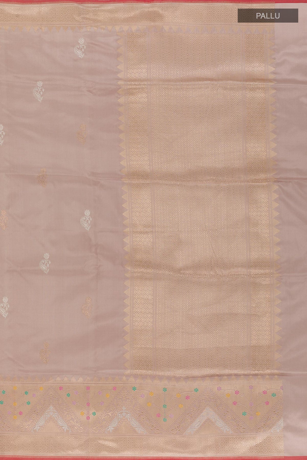 Close up image of the pallu of Beige Banarasi Silk Saree with Zari Butta on the body and Zari Border. 