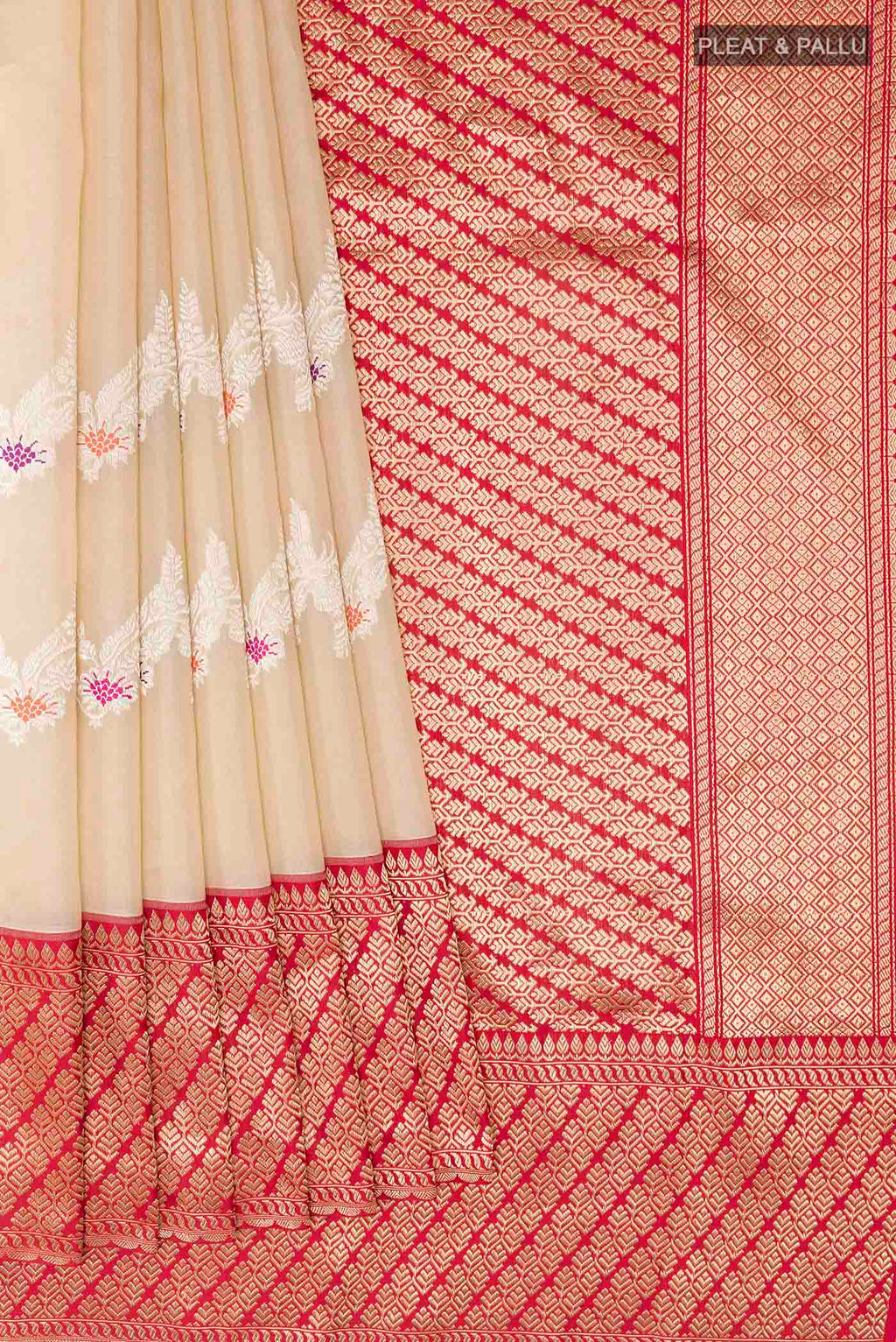 Pleats and pallu of Cream Banarasi Kora Silk Saree with Zari Brocade on the body and Zari Border