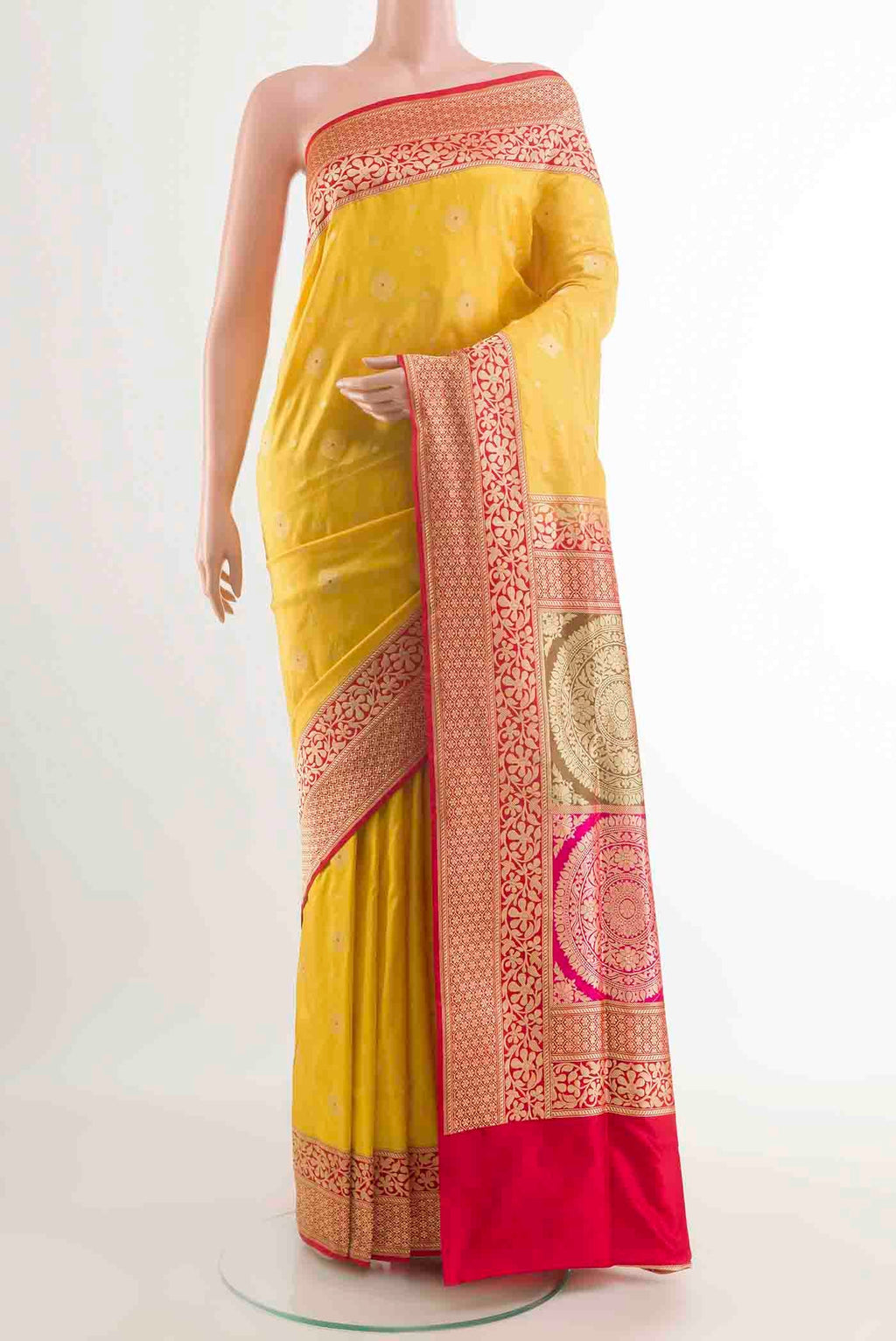 Yellow Banarasi Silk Saree with Zari Butta on the body and Zari Border displayed on a mannequin