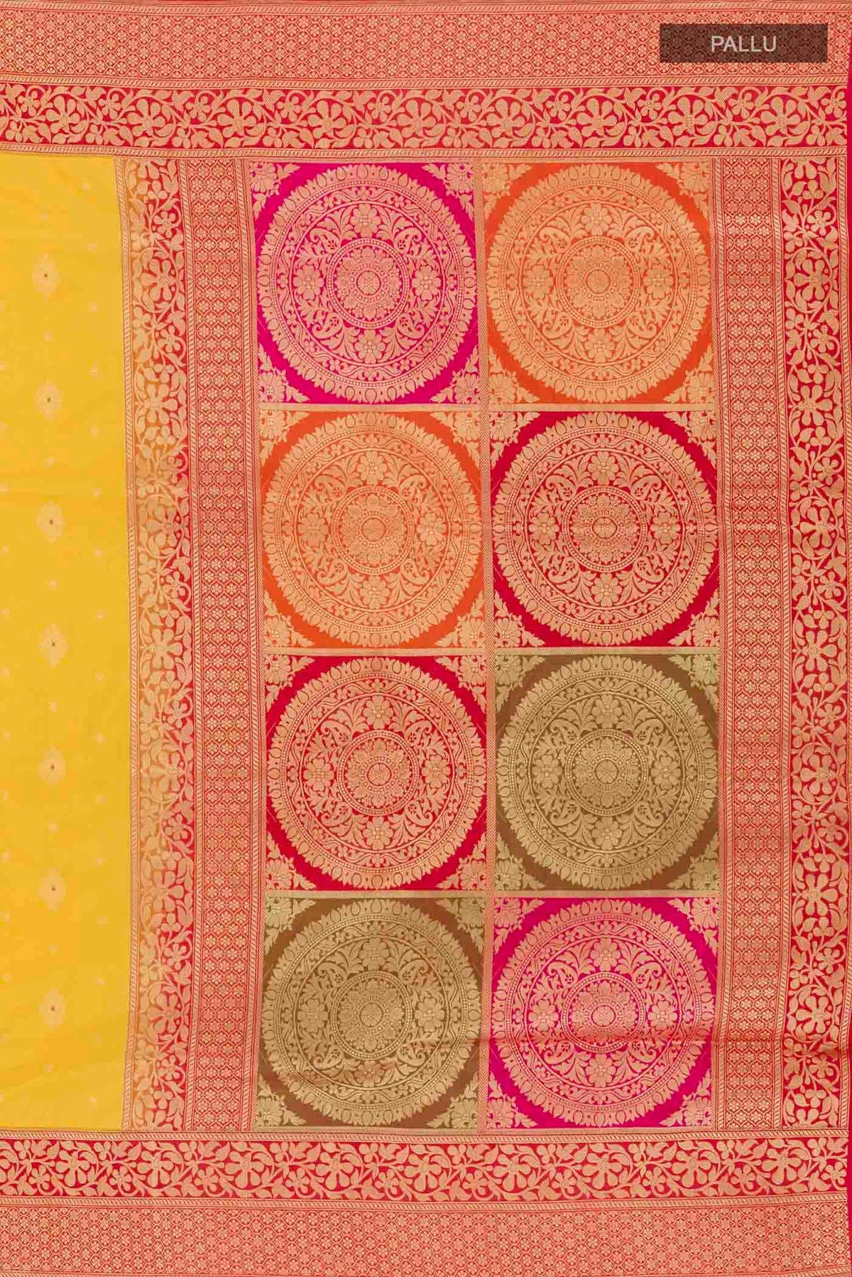 Close up image of the pallu of Yellow Banarasi Silk Saree with Zari Butta on the body and Zari Border