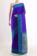 Blue Kanchipuram Silk Saree with Zari Butta on the body and Zari Border displayed on a mannequin