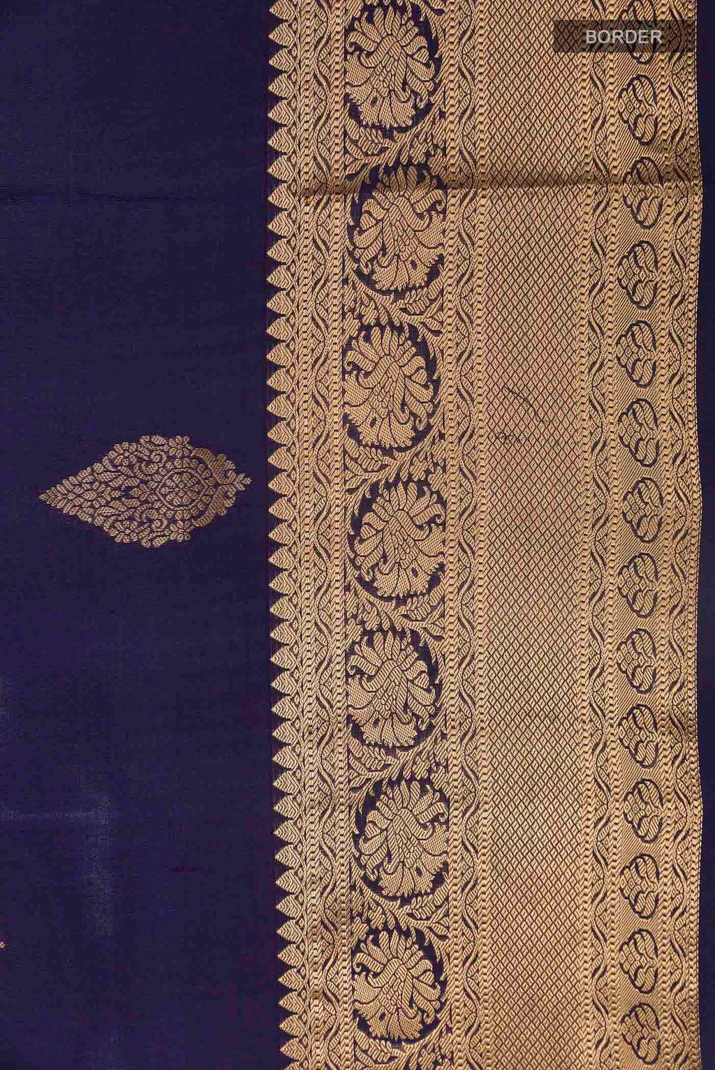 Border image of Navy Blue Soft Silk Saree with Zari Butta on the body and Zari Border