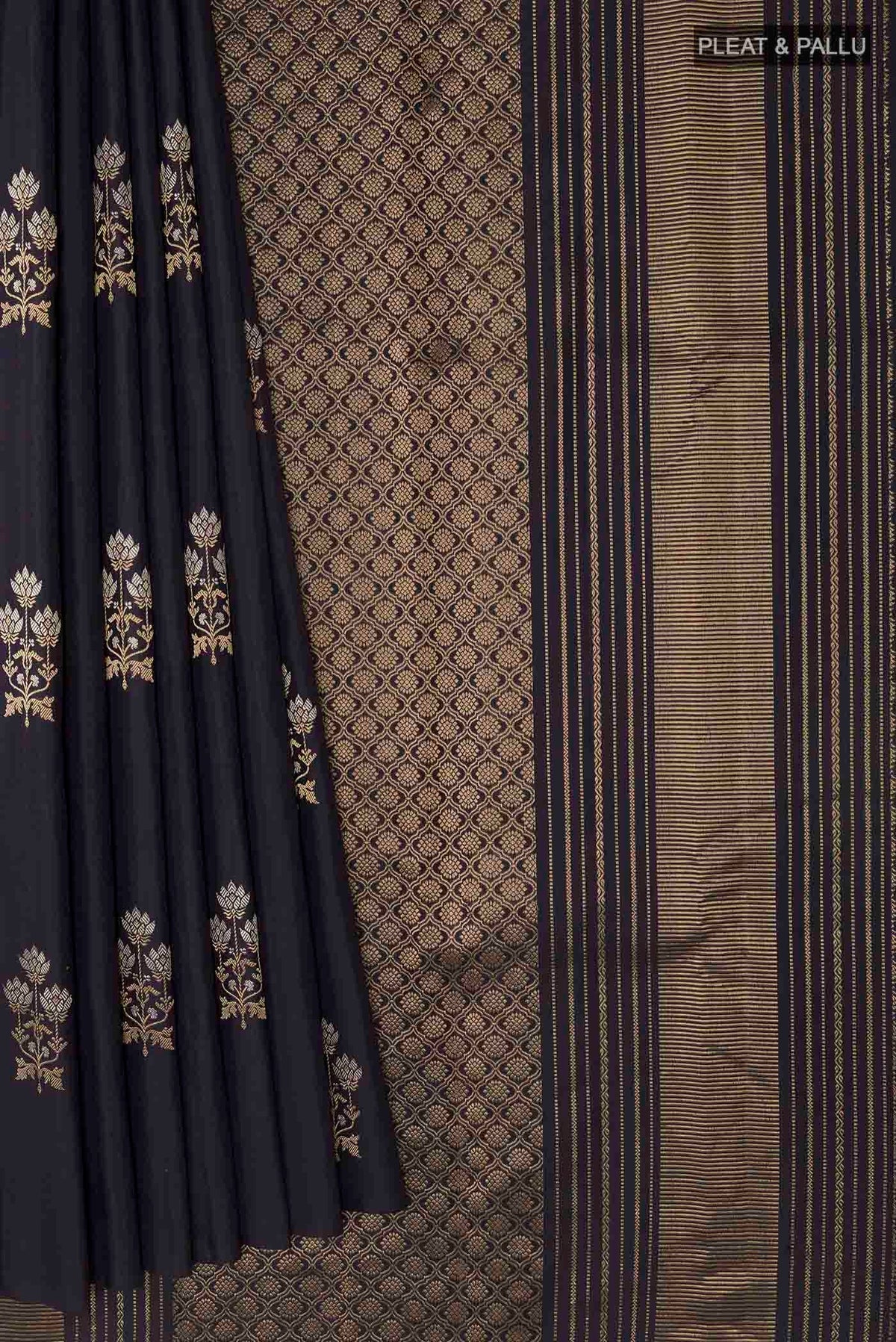 Pleats and pallu of Dark Blue Kanchipuram Silk Saree with Zari Butta on the body and Zari Border