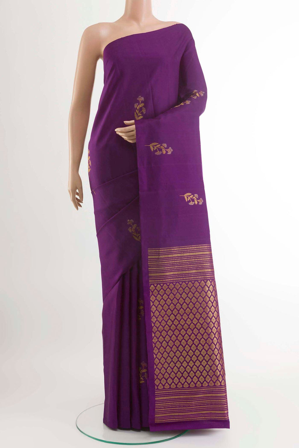 Dark Blue Kanchipuram Silk Saree with Zari Butta on the body and Zari Border displayed on a mannequin