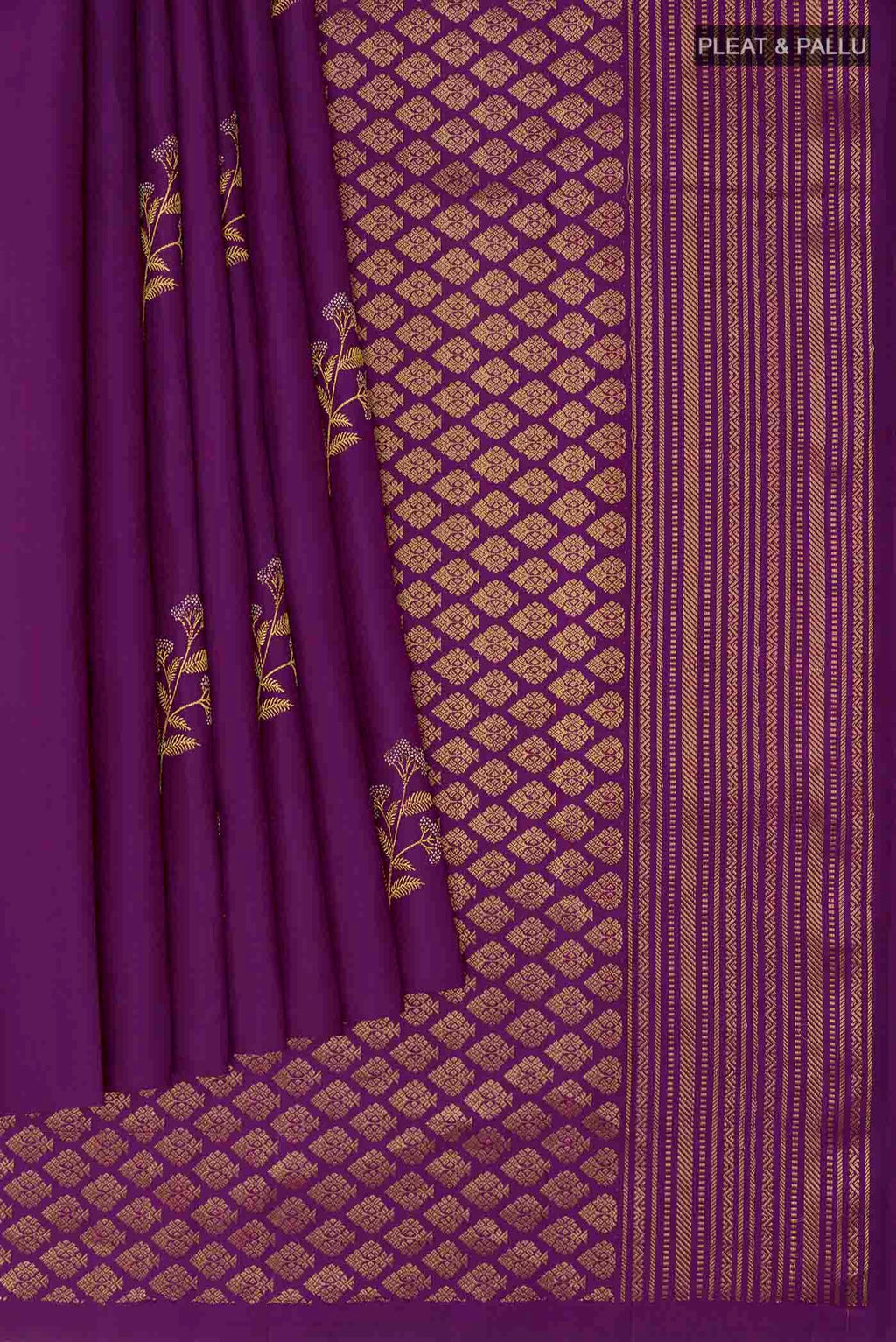 Pleats and pallu of Dark Blue Kanchipuram Silk Saree with Zari Butta on the body and Zari Border