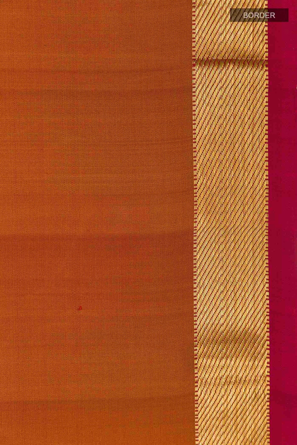 Border image of Brick Orange Kanchipuram Silk Saree with Plain Body and Zari Border