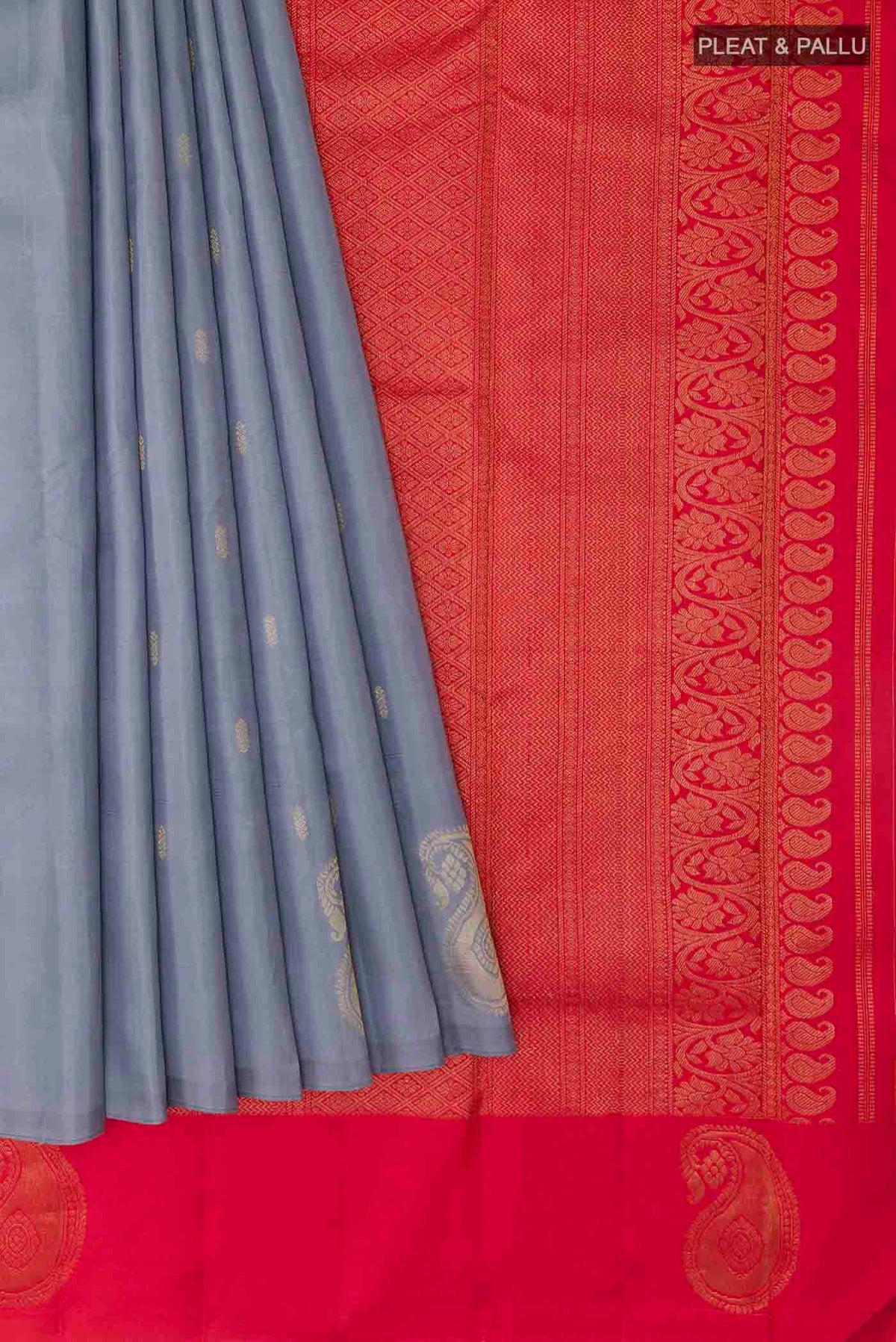 Pleats and pallu of Grey Kanchipuram Silk Saree with Zari Butta on the body and Zari Border