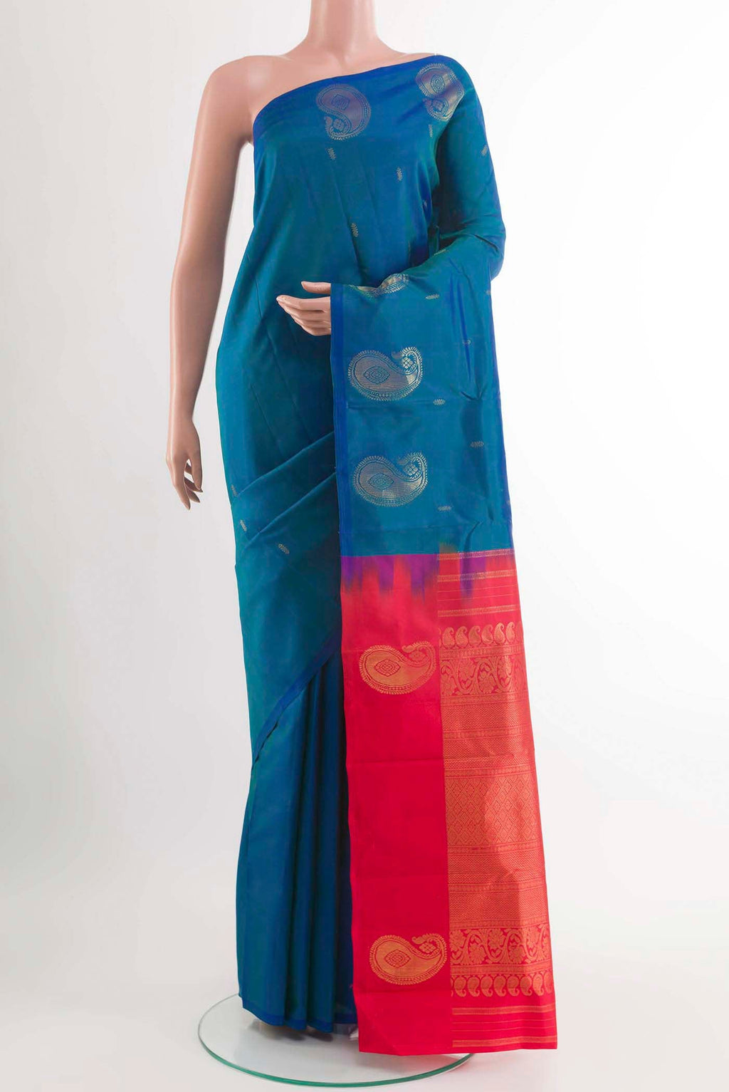 Blue Kanchipuram Silk Saree with Zari Butta on the body and Zari Border displayed on a mannequin