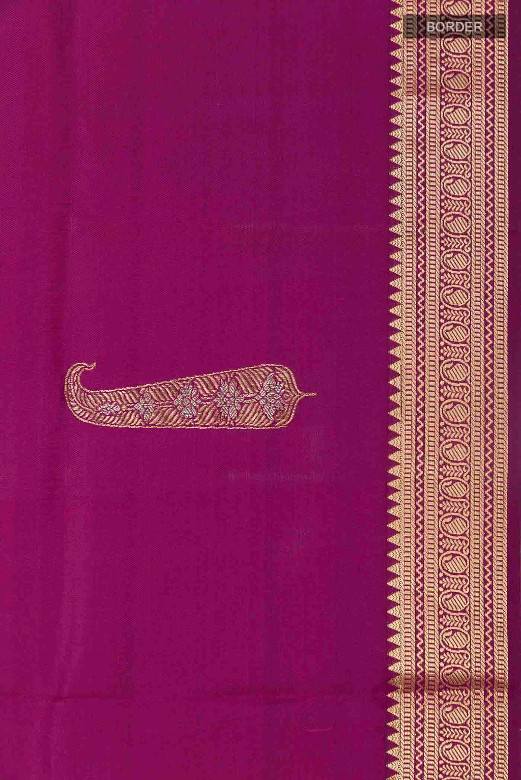Border image of Purple Soft Silk Saree with Zari Butta on the body and Zari Border