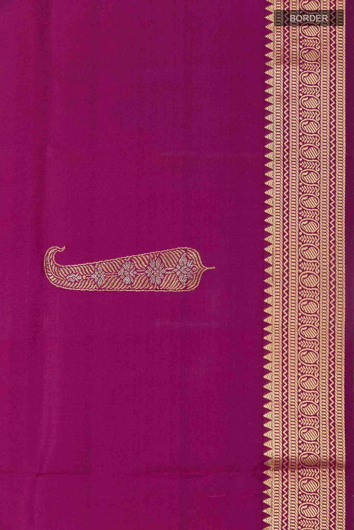 Border image of Purple Soft Silk Saree with Zari Butta on the body and Zari Border