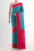 Blue Pochampally Silk Saree with Pure Ikat on the body and Zari Border displayed on a mannequin