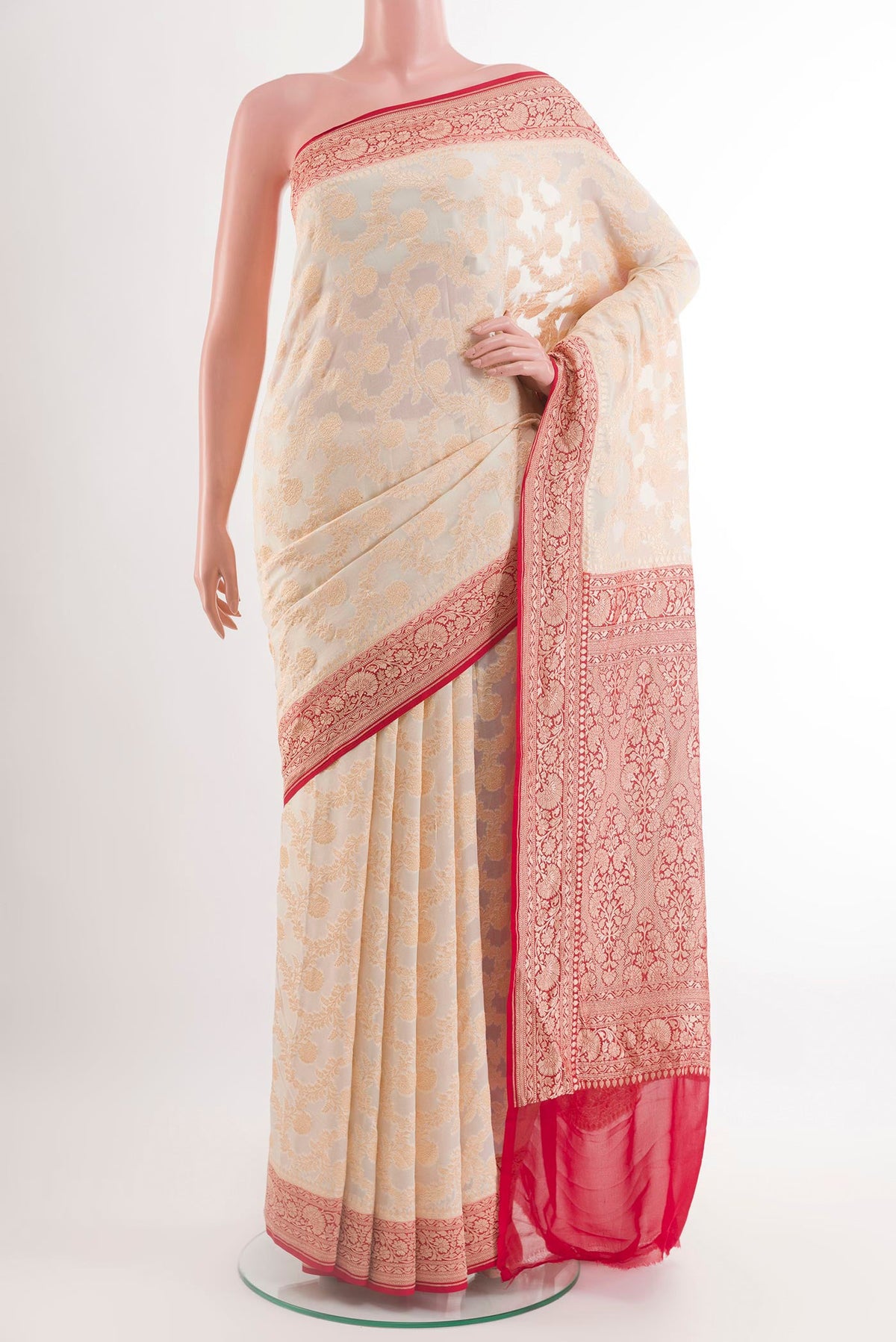 Off White Banarasi Georgette Saree with Zari Brocade on the body and Zari Border.  displayed on a mannequin