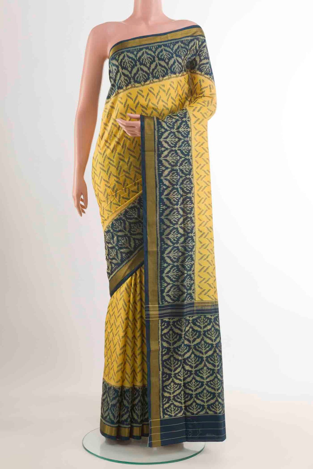 Yellow Rajkot Patola Silk Saree with Pure Ikat on the body and Zari Border displayed on a mannequin