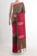Brown Tussar Silk Saree with Zig Zag design on the body and Zari Border displayed on a mannequin