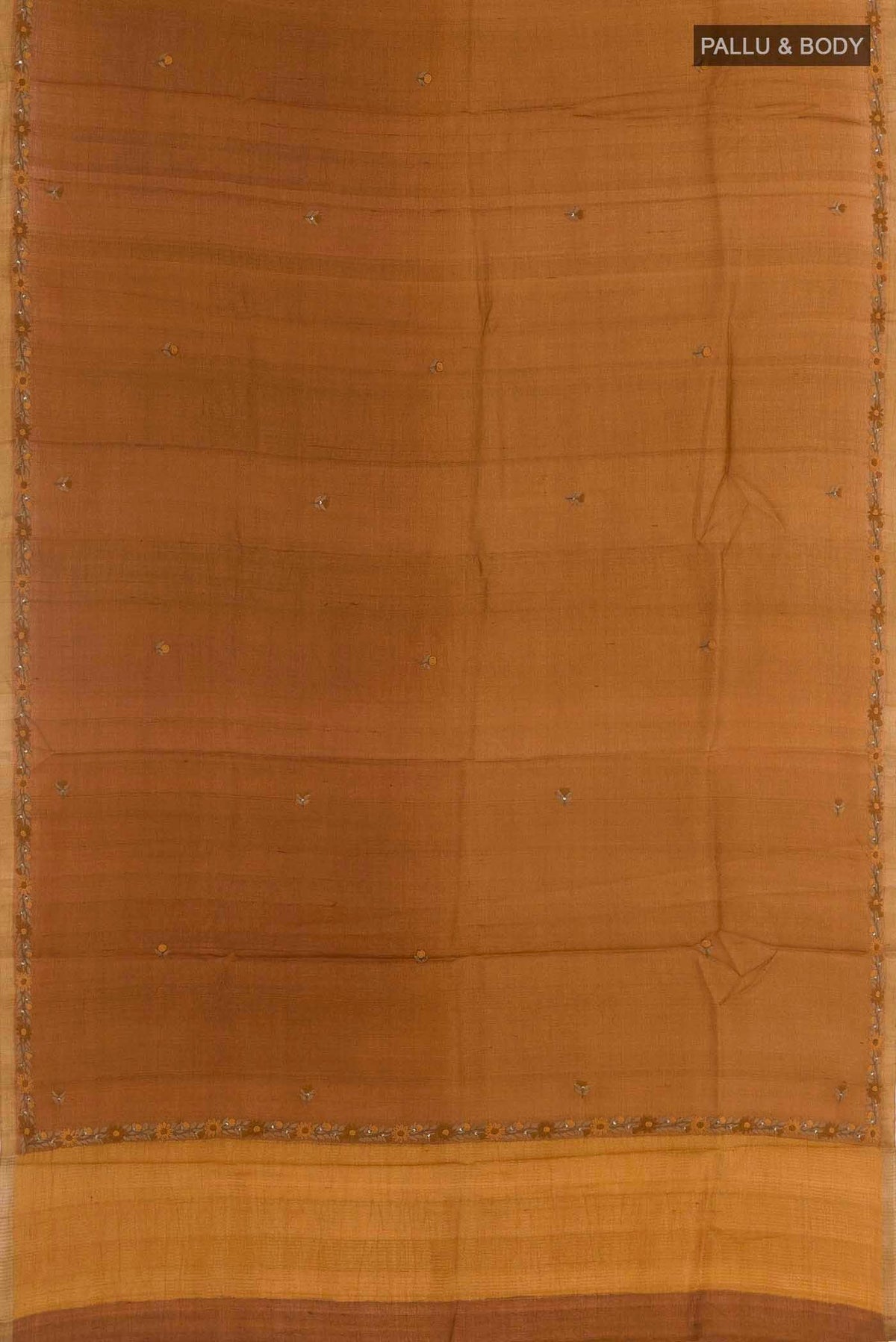 Flat view of Brown Tussar Silk Saree with Embroidery on the body and Embroidery Border