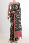 Black Tussar Saree with Printed design on the body and Zari Border displayed on a mannequin