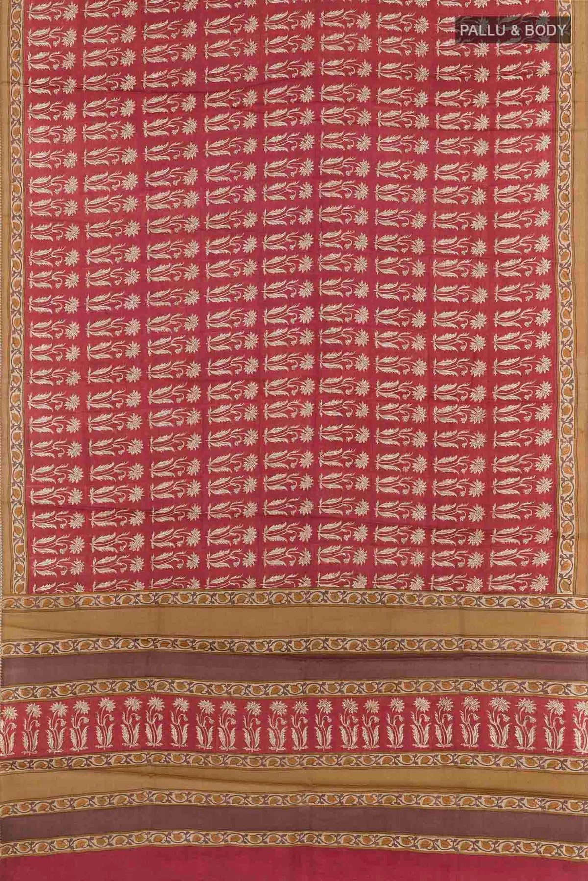 Flat view of Red Tussar Saree with Printed design on the body and Printed Border. 